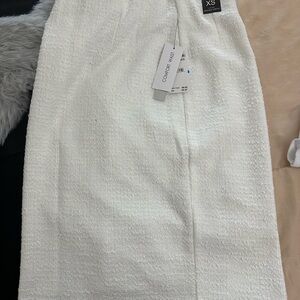 White Textured Skirt by Concept K